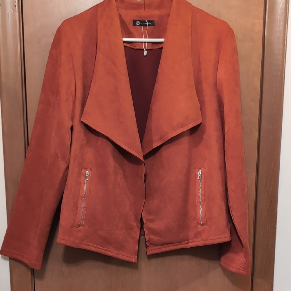 Women's Elegant Rust Blazer- Has a soft suede like feel.